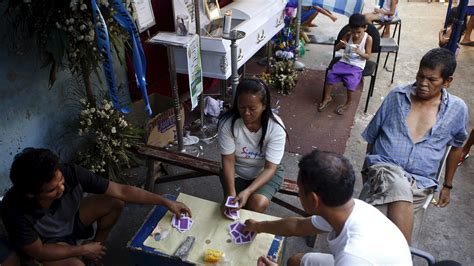 In the Philippines, mourners honor the dead by .